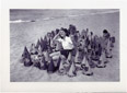 Vintage 1930 Girl on Beach surrounded by Witches Hats, Cats